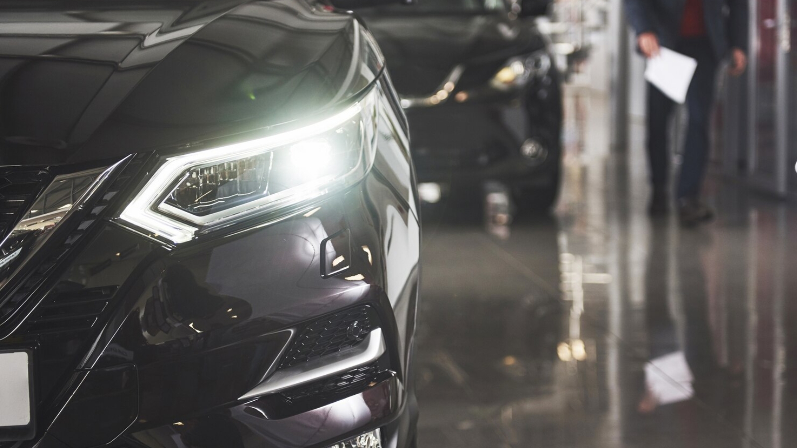 headlights-hood-black-luxury-car_146671-19730